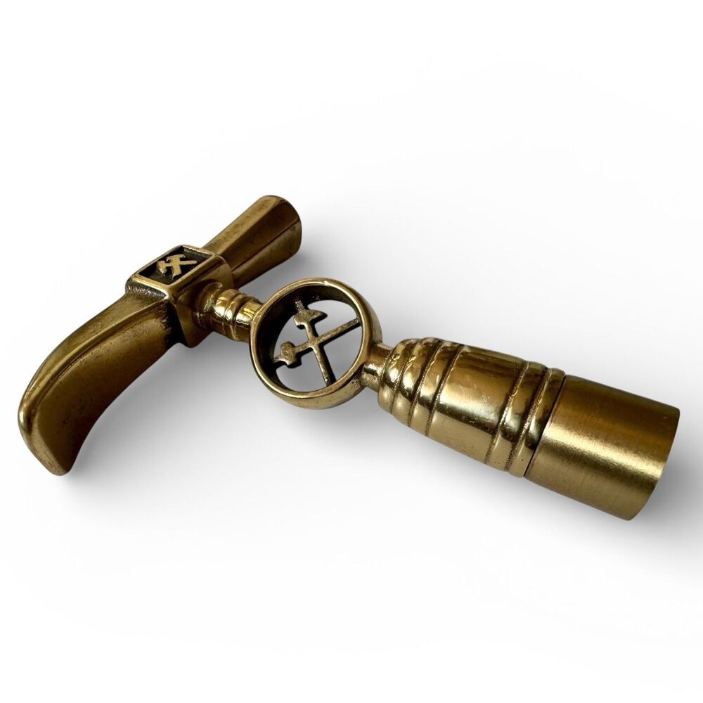 Vintage brass cane handle with miners' symbols